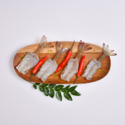 Raw peeled and deveined tail on butterfly cut